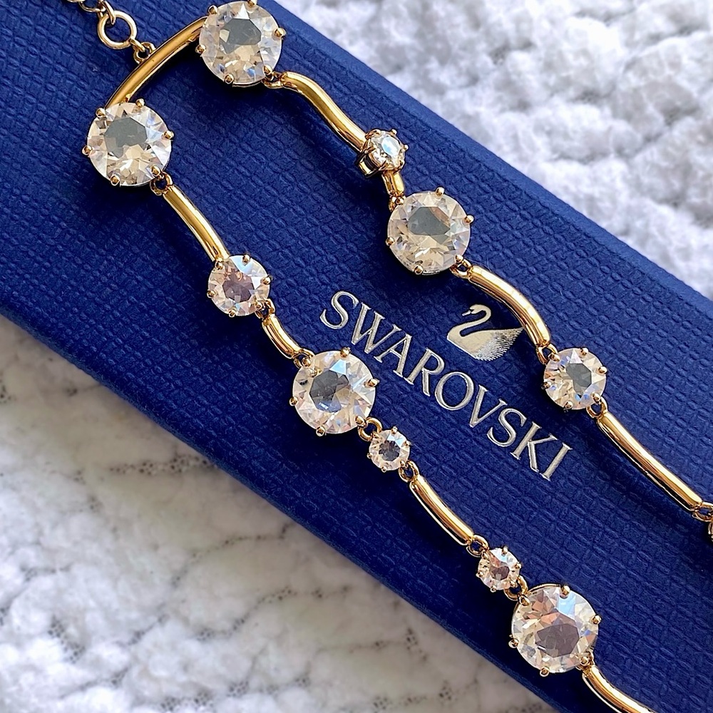 Swarovski “Constella” Gold-tone Double-Row Bangle Bracelet